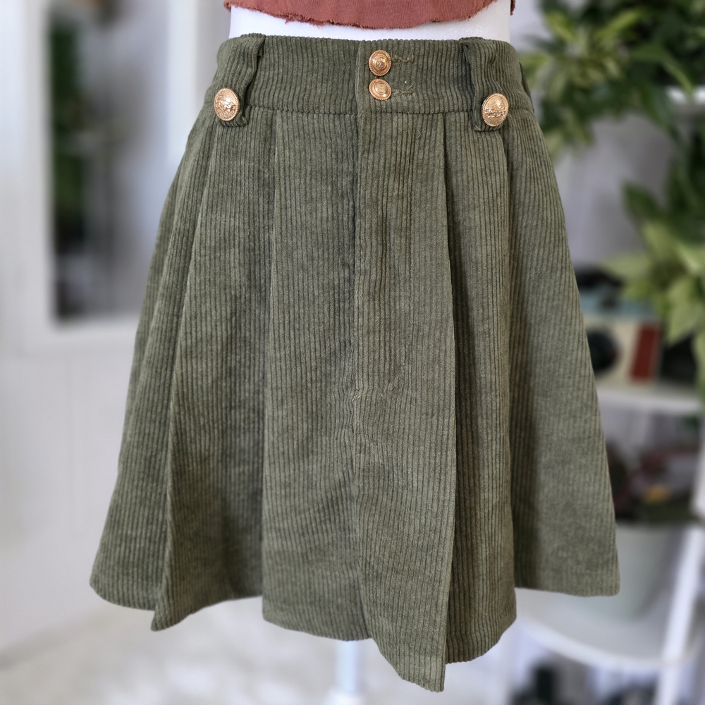 Olive green pleated corduroy mini skirt